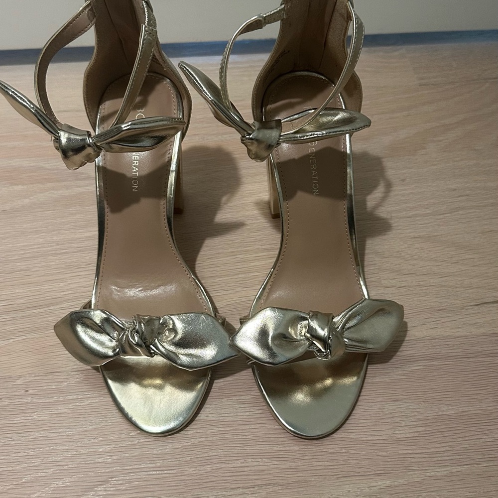 BCBGeneration Gold Stiletto Heels with Ankle Strap